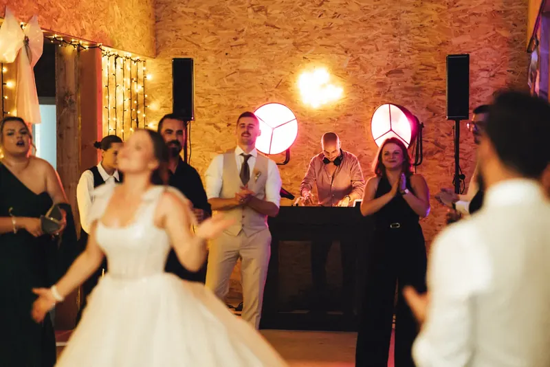 Bride dancing on a full wedding dance floor